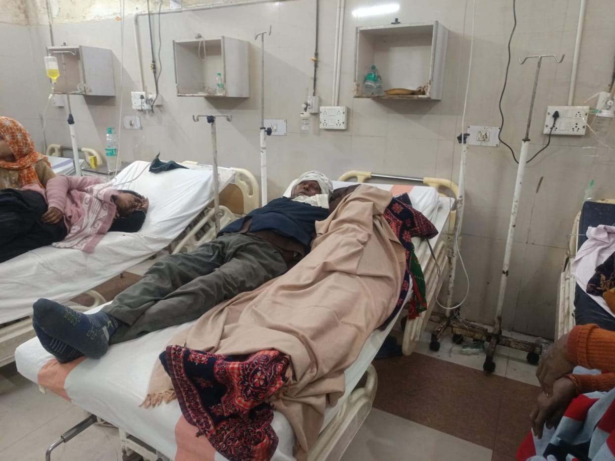 The trauma center is facing a severe shortage of resources, with two patients sharing a single bed.