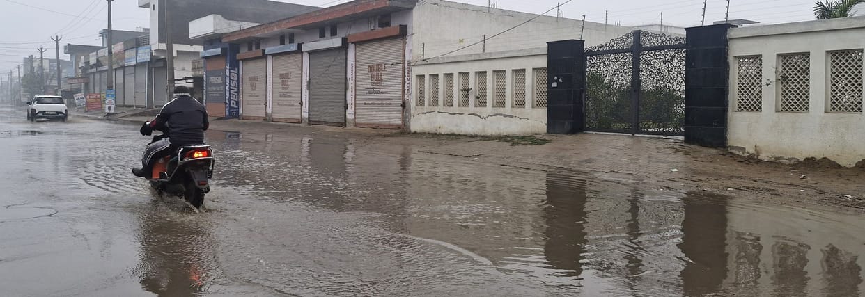 People are troubled by waterlogging on the road and demand that a proper drainage system be put in place.