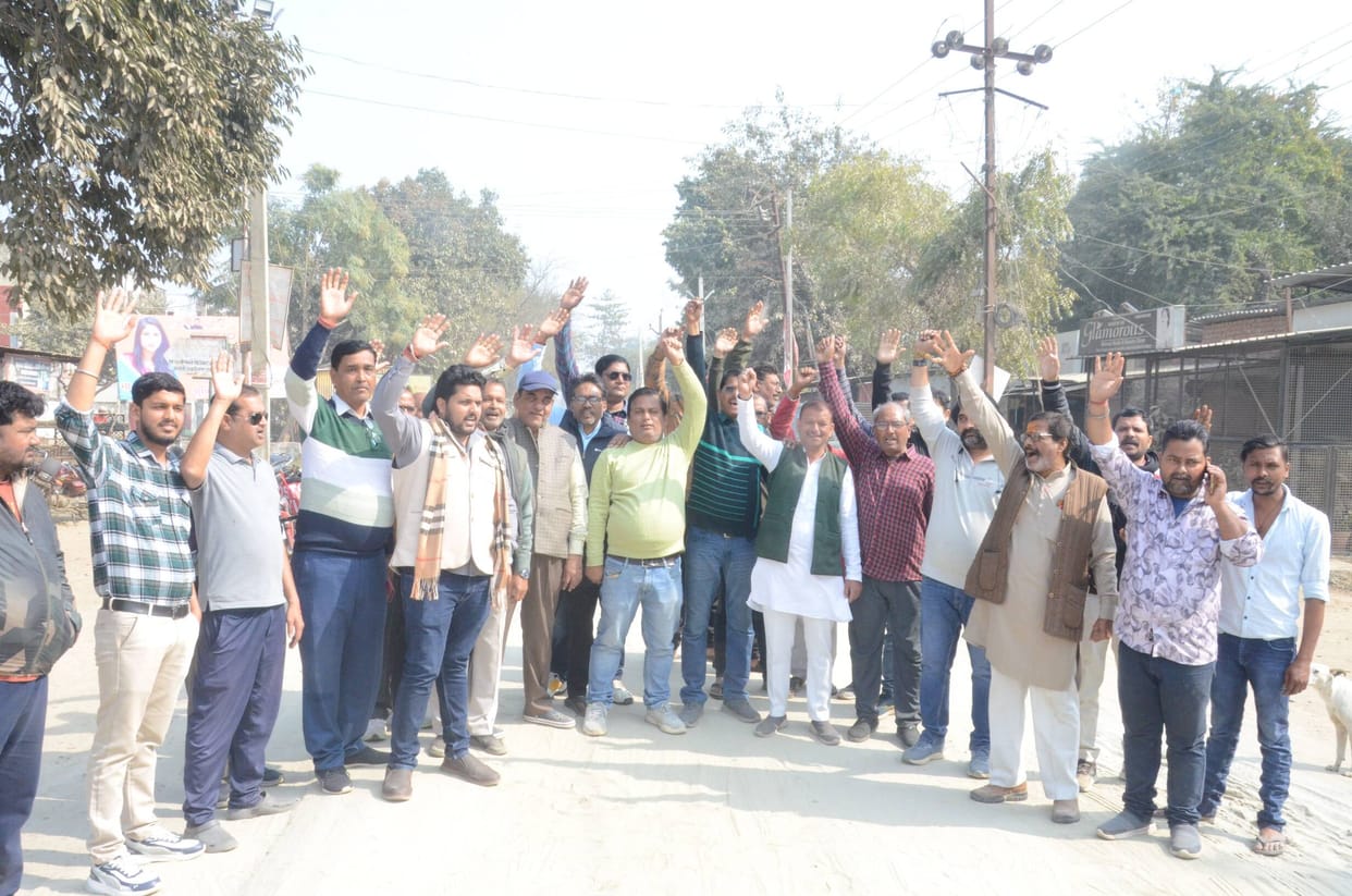Instead of repairing the road, sand was put in the potholes, leading to protests.