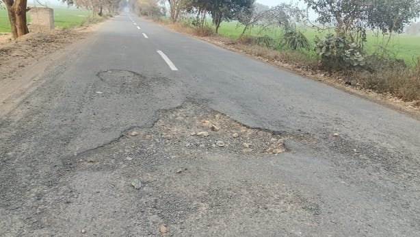 Distance indicators on Bhattu Kalan-Banmandori road have disappeared, potholes have formed