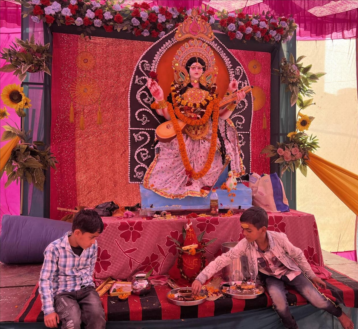 The goddess of knowledge was worshipped, cheers echoed in the pandals.