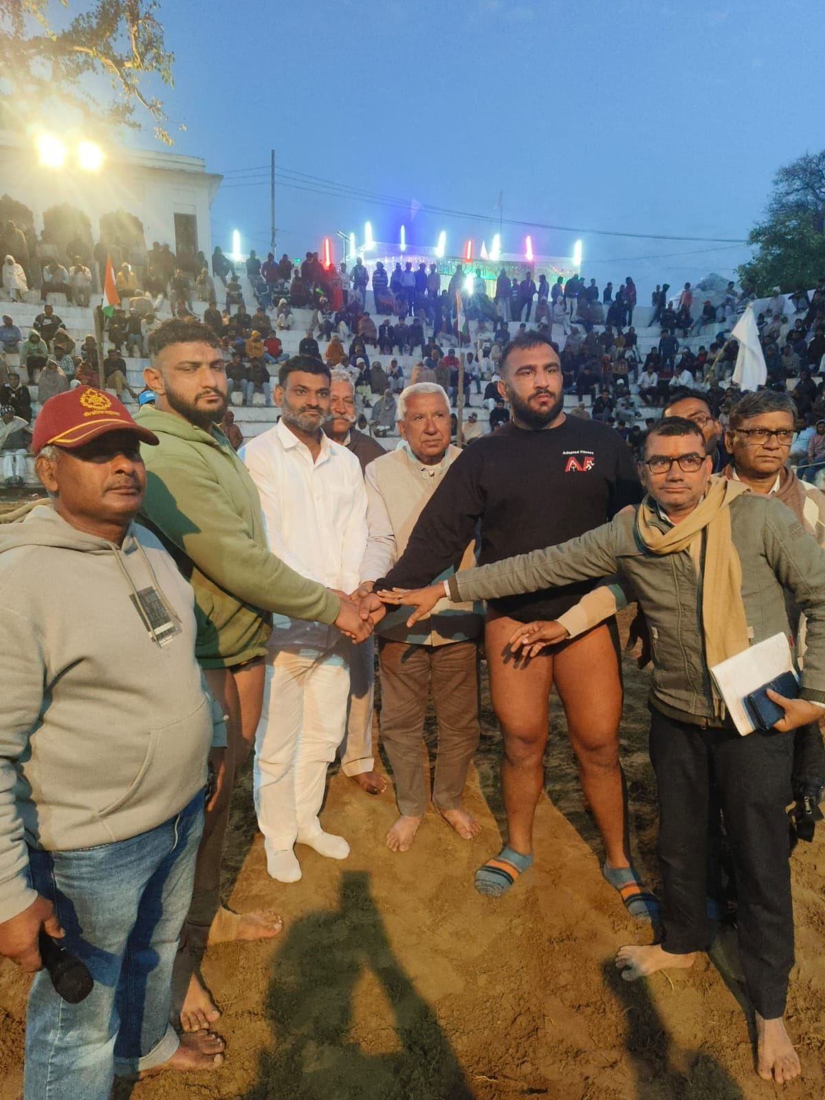 In the sports extravaganza, two wrestling matches involving 61,000 participants ended in a draw.