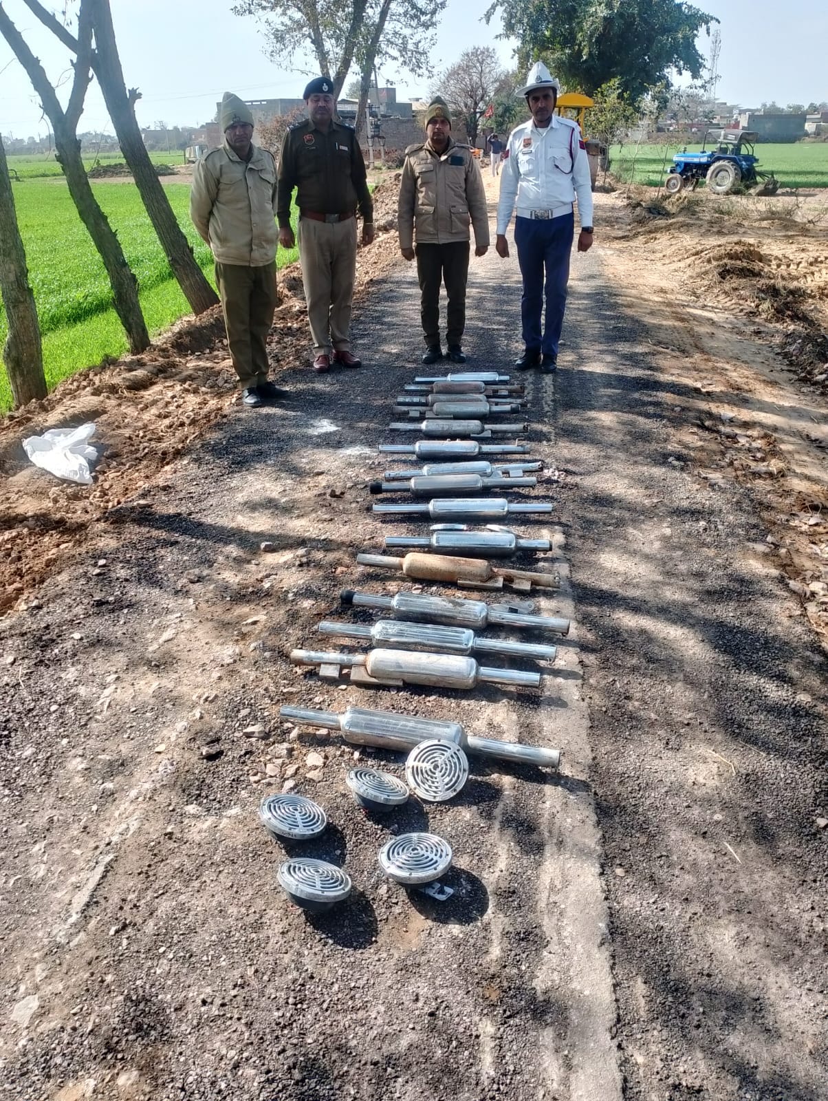 Heavy horns and modified silencers destroyed with a road roller