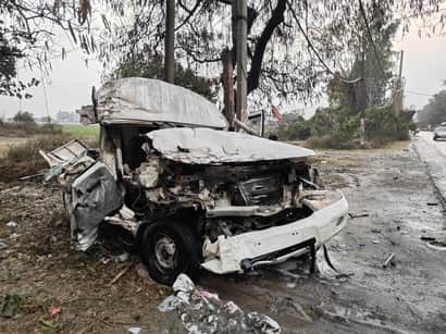 Pickup and dumper collide head-on, driver injured