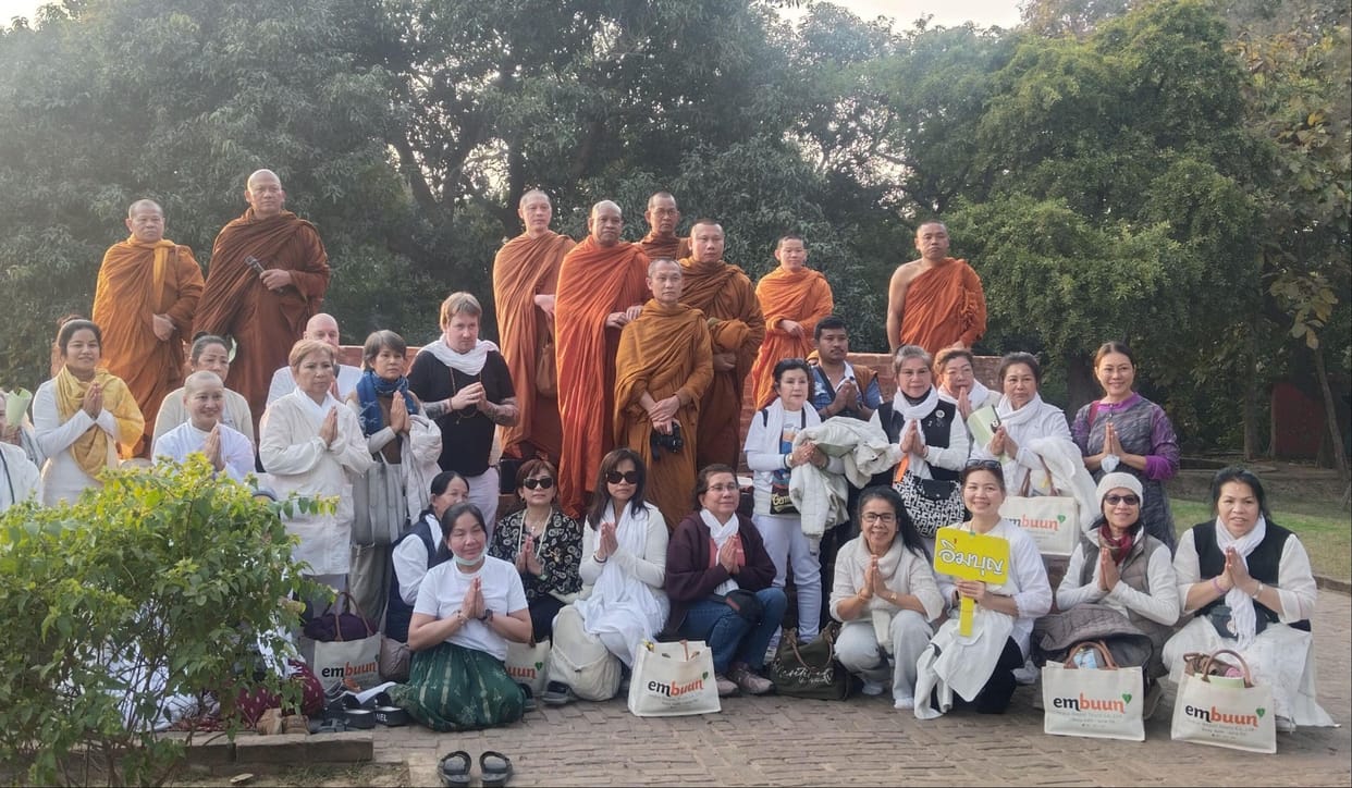 Followers worship the Bodhi tree