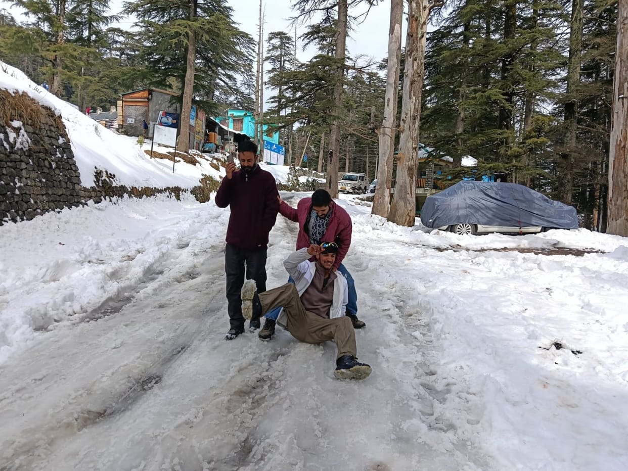 Tourists were delighted to see snow, but slippery roads added to their troubles.