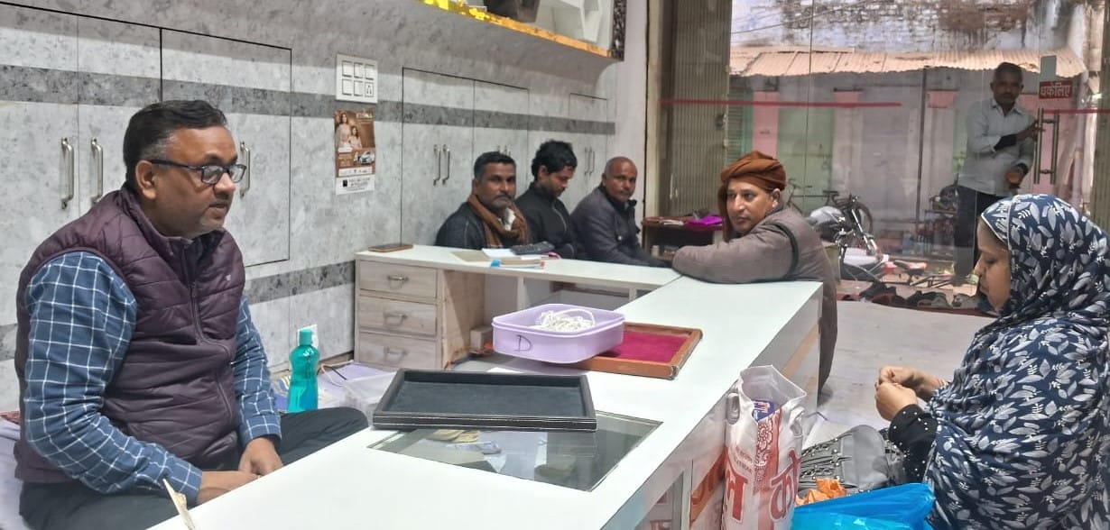 Customers are returning from the jewellery shop after asking the price.
