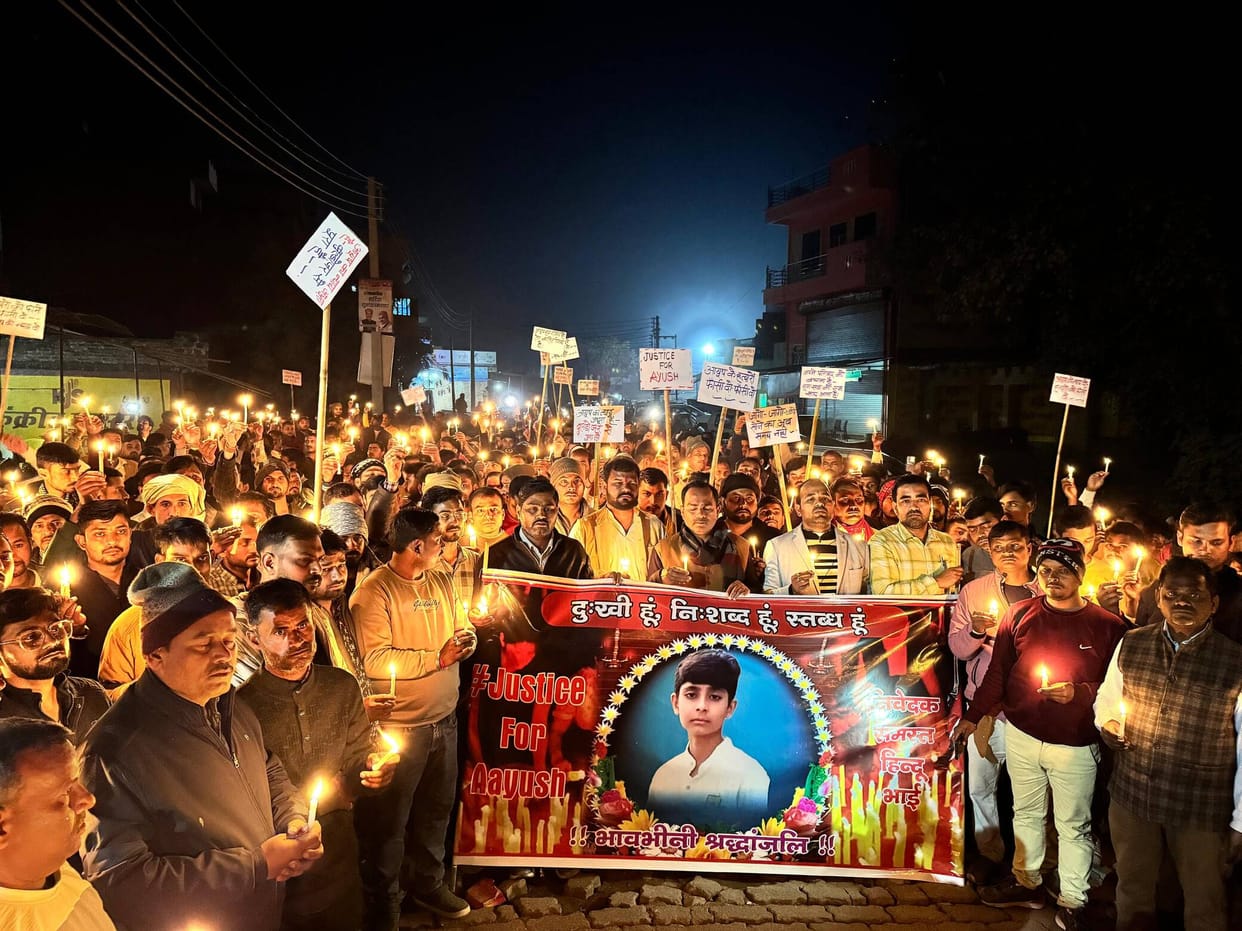 Traders held a peaceful candlelight march.