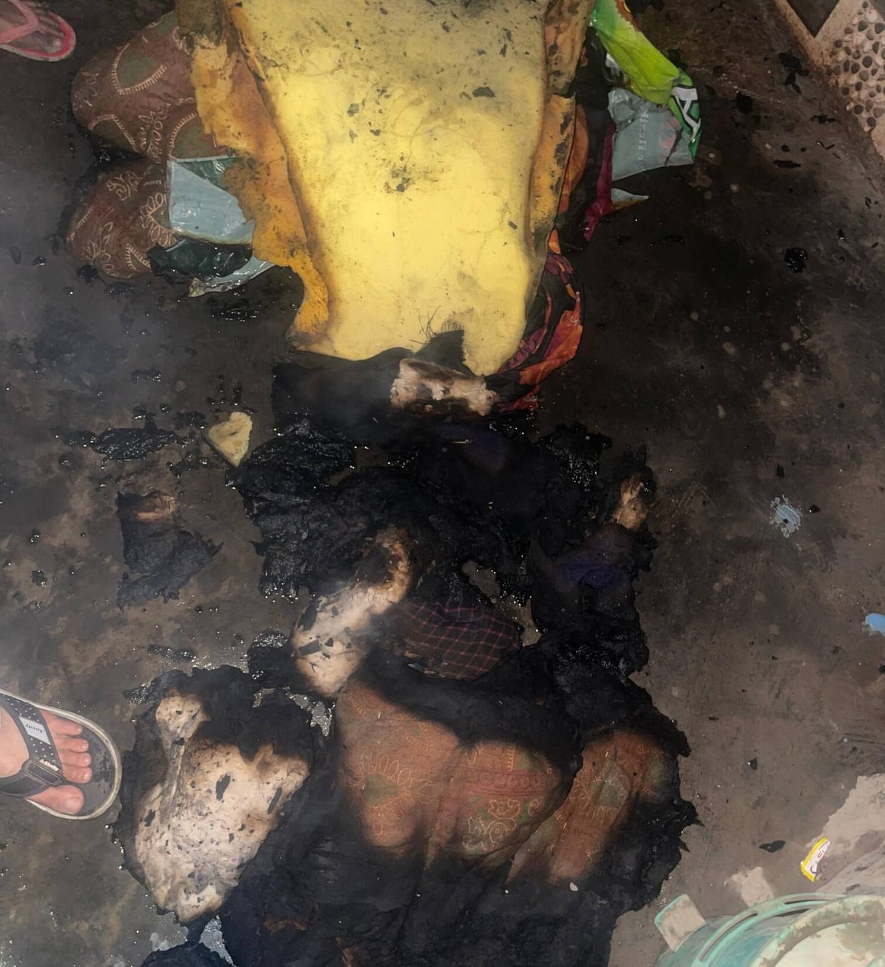 A fire broke out in the house due to a candle, burning household items.
