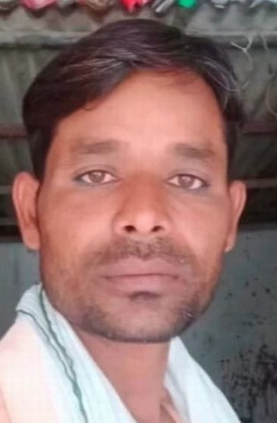 A young man was murdered by having his head crushed with a brick; his body was found lying in a field.