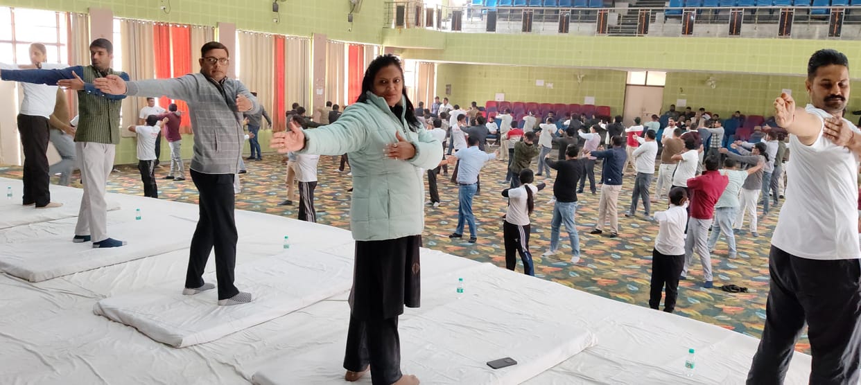 Officers and employees performed Surya Namaskar