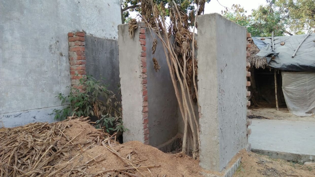 Roofless and incomplete toilets are mocking the ODF village.