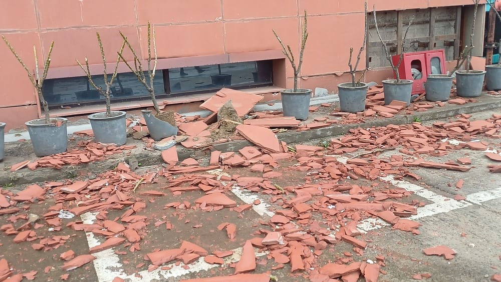 Rain caused stones to fall from the subdivision building, built at a cost of Rs 41.52 crore, averting an accident.