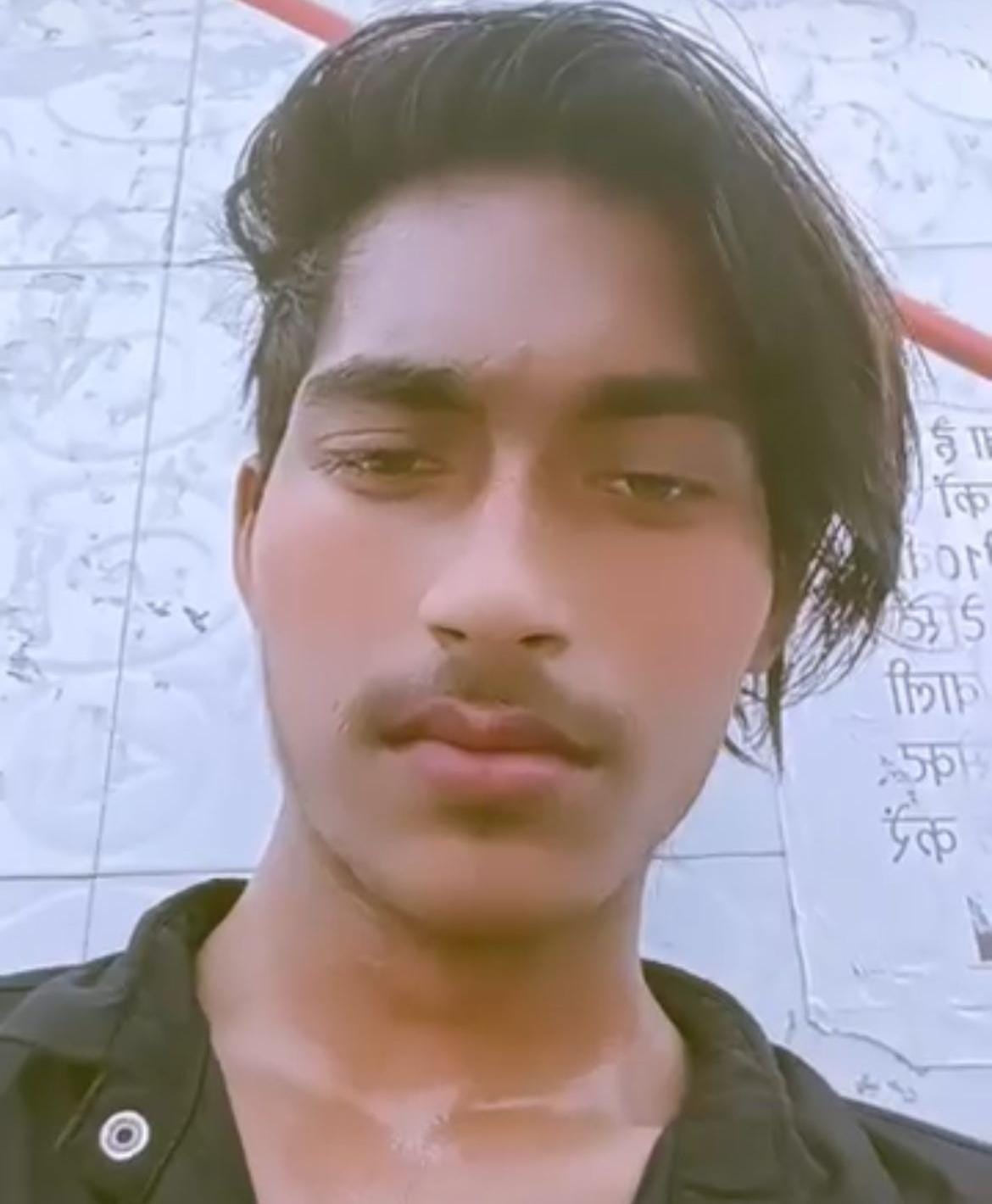 Youth's body found hanging, brother alleges murder