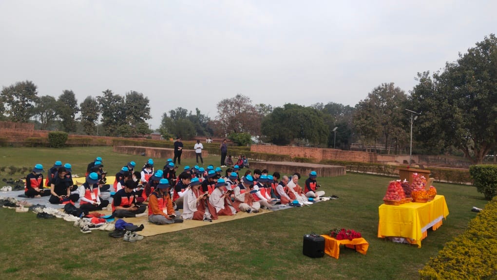 Followers worship the Bodhi tree