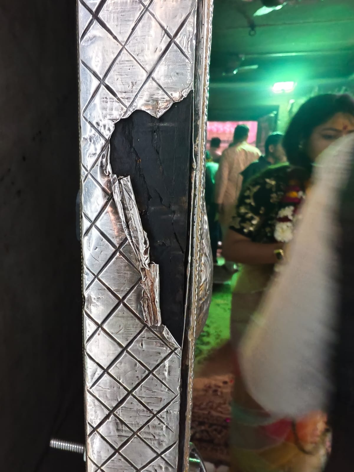 Chemical-laden perfumes are damaging the silver inlay on the doorframe of the Shri Banke Bihari temple.
