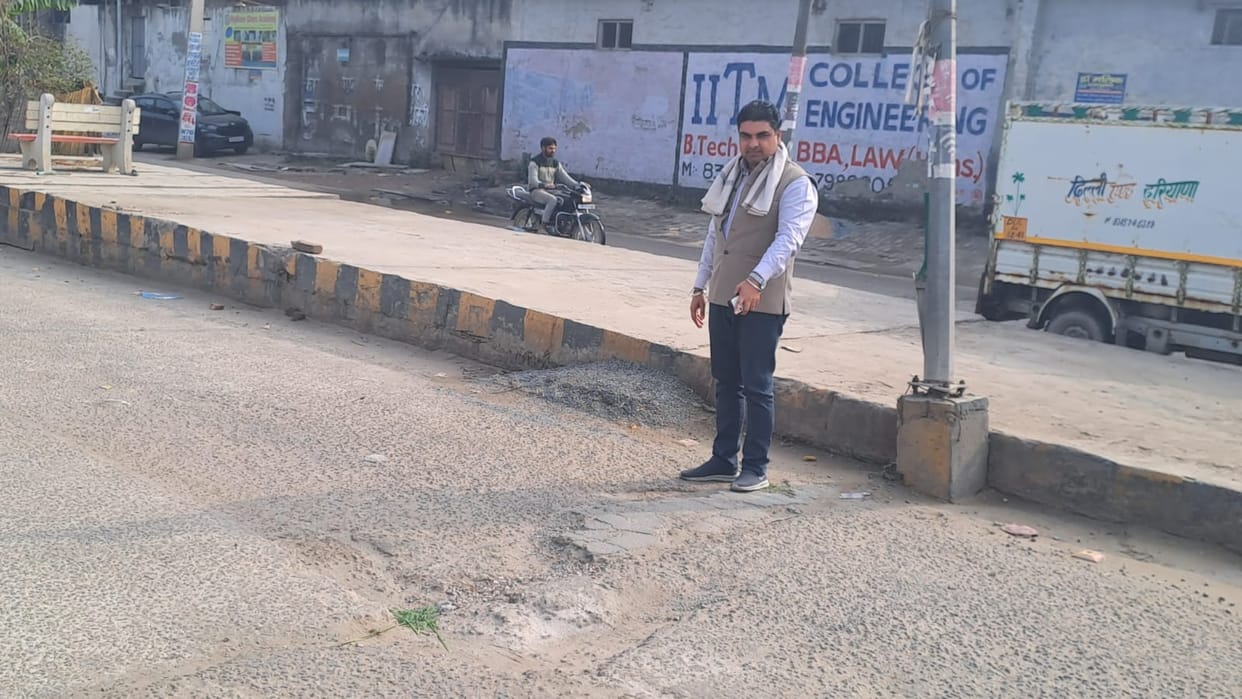 Potholes on the road near West Juan Drain