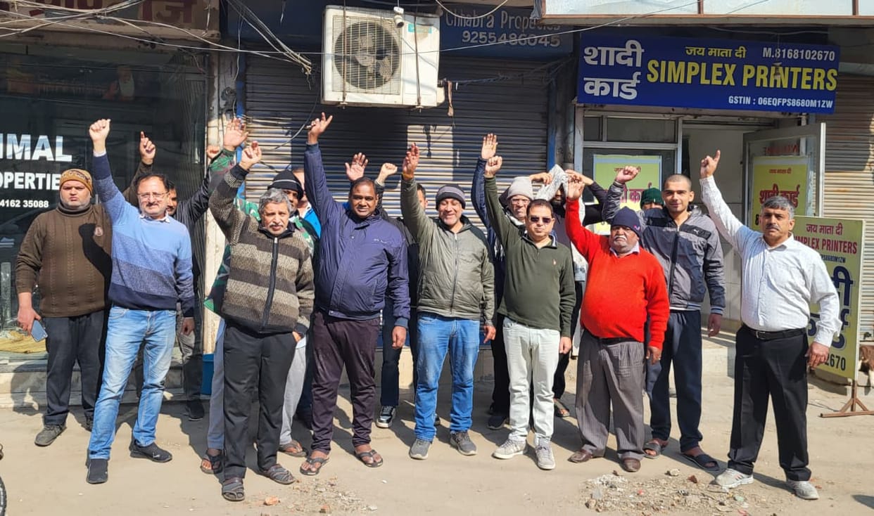 Traders protest after being fined.