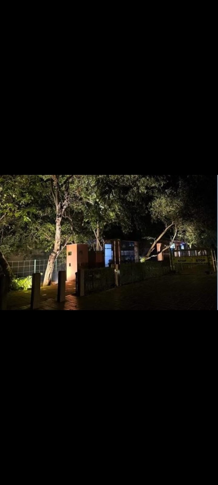 Facade lights illuminate the path to the Taj Mahal