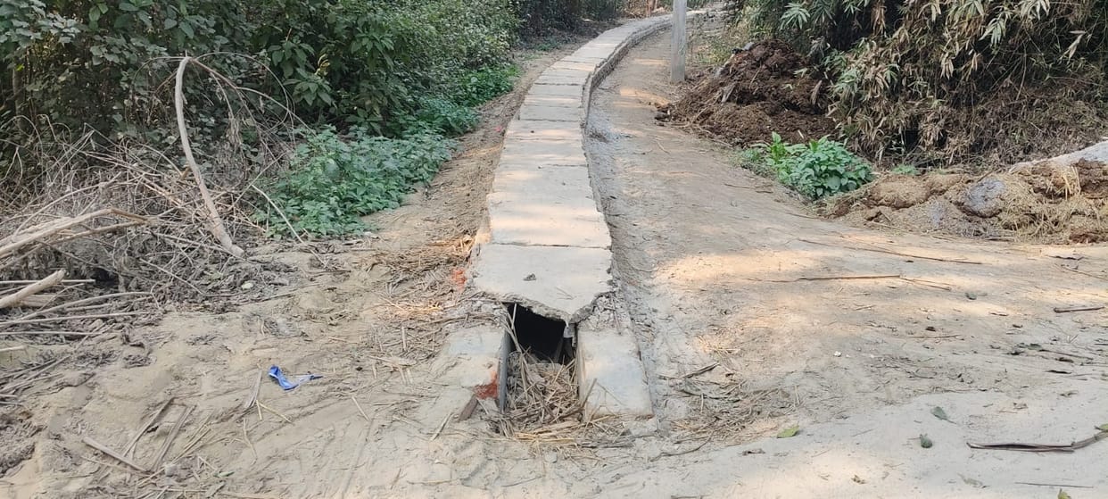 Drain constructed in the middle of the road
