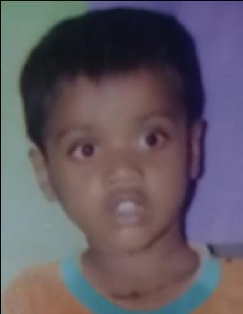 A boy standing by the roadside was killed in a vehicle collision.