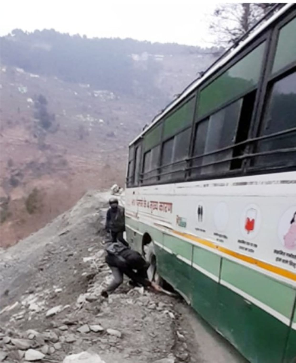 HRTC bus with 15 passengers narrowly escapes falling into ditch after road caves in