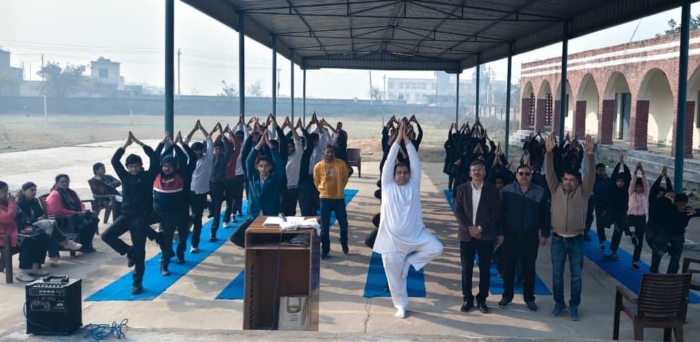 Students practiced yoga at the government school in Asauda.