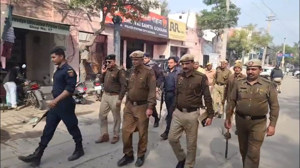 Police organized a foot march and assured the traders of security.