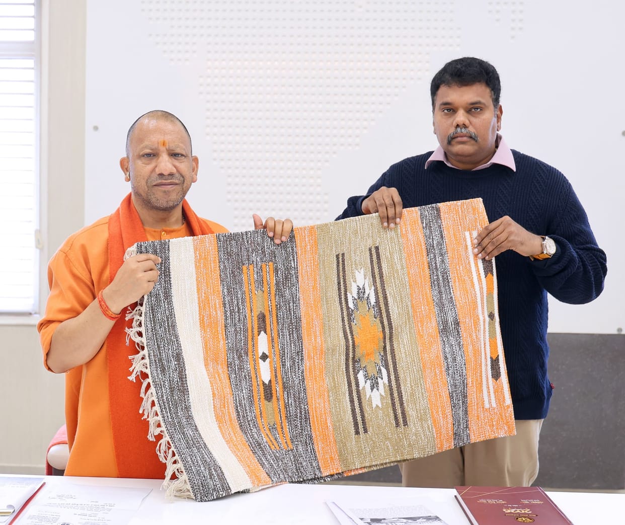 DM met CM, presented carpet made in Sitapur