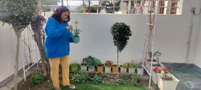 Medicinal and flowering plants grow in the courtyard of President's Award winner Sunita's house.