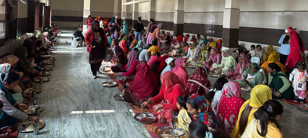 Devotees took prasad in the bhandara