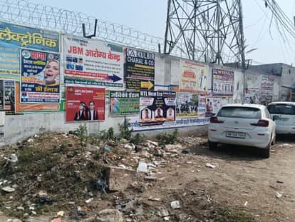 Government walls and intersections are filled with posters and hoardings, employees are shirking their responsibility by doing the bare minimum.