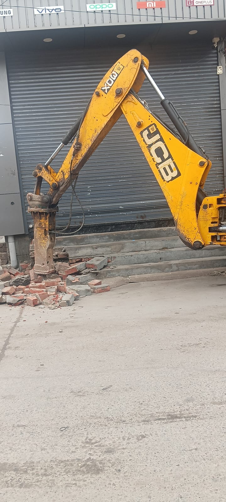 The ramps in front of the shops were demolished to make way for the construction of drains.