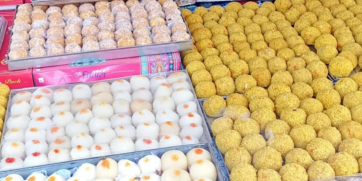 Be careful! Colourful sweets can harm your health.