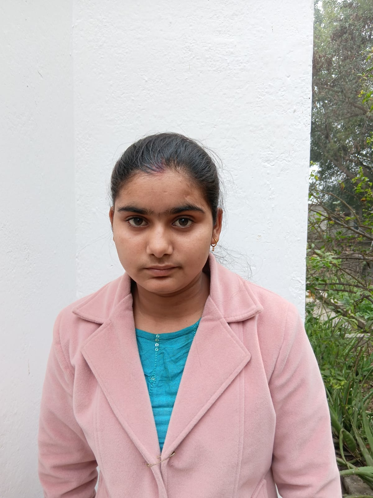 The teenage girl committed suicide by hanging herself.