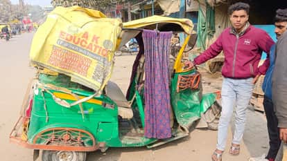 Teacher's car collides with auto, woman killed, 11 injured