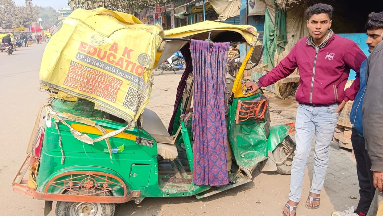 Teacher's car collides with auto, woman killed, 11 injured