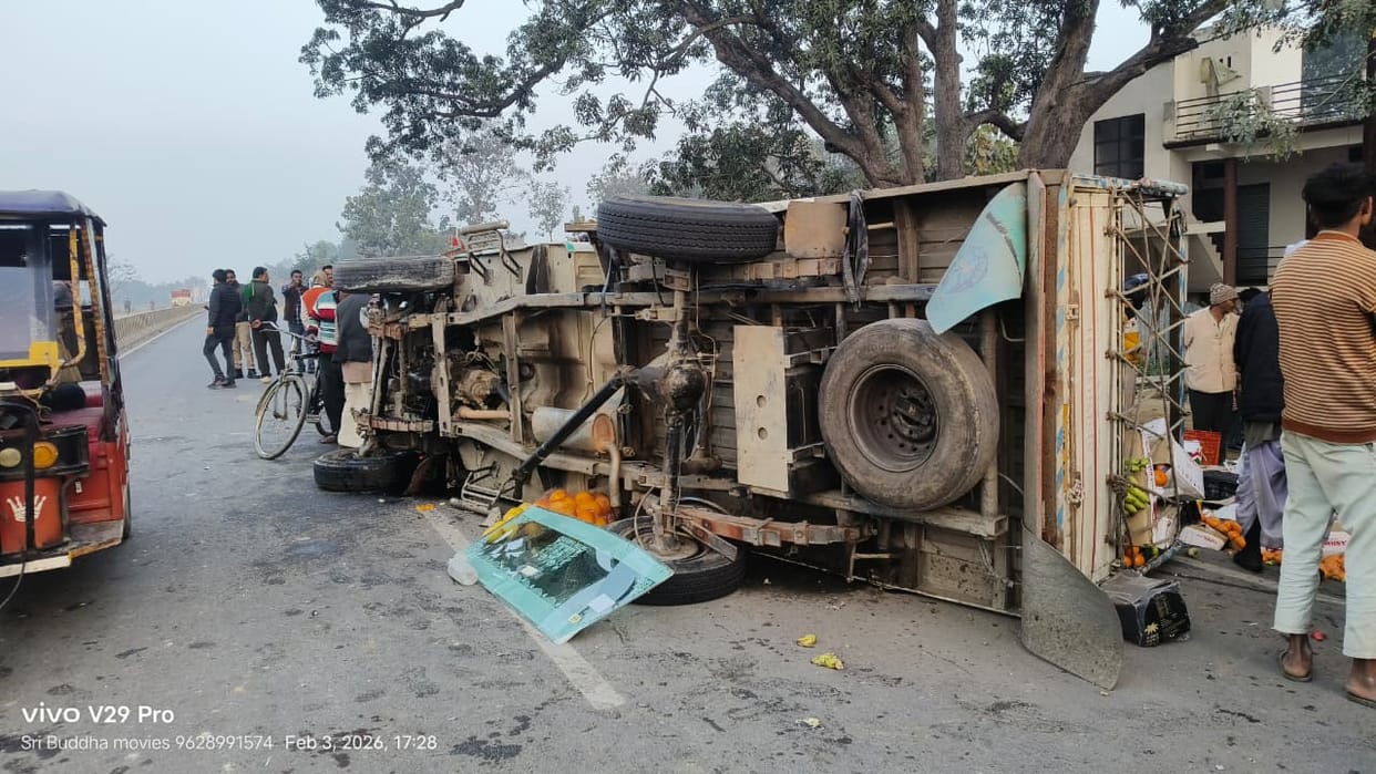 The pickup overturned after hitting the divider