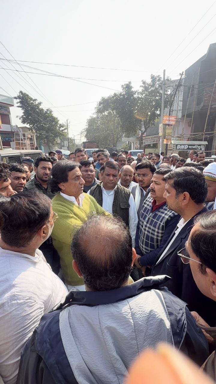 Following villagers' outrage, the mayor walked through muddy streets.