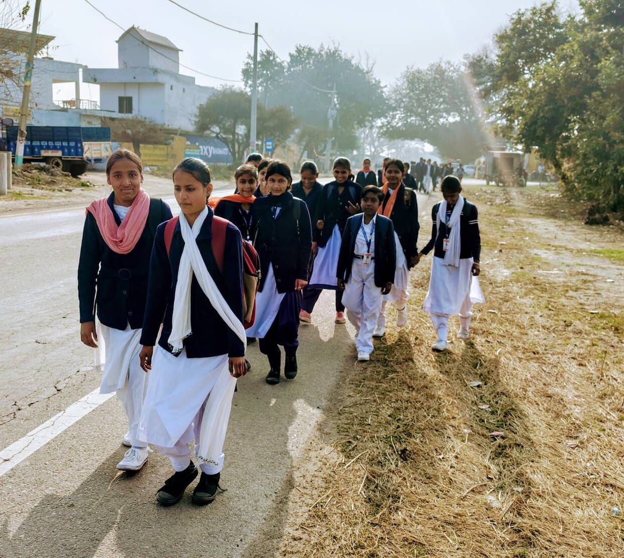 Manchuri children forced to walk six kilometers to school, plead with the government for a bus.
