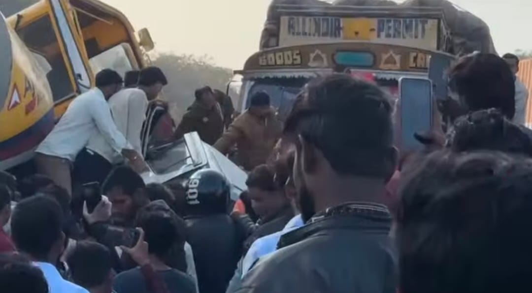A truck hit it from behind, and the car collided with a mixer machine in the opposite lane.
