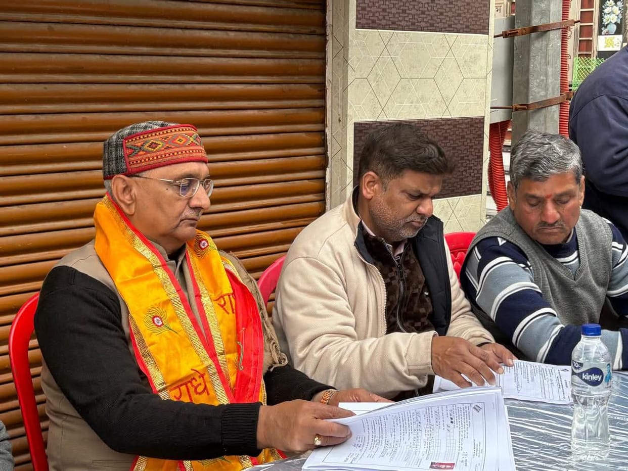 The mayor inspected voter records at the polling booths.