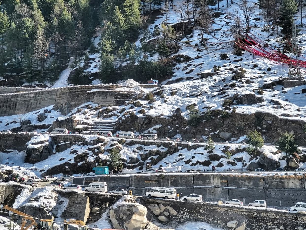 Tourists enjoy the snow in Solangnala