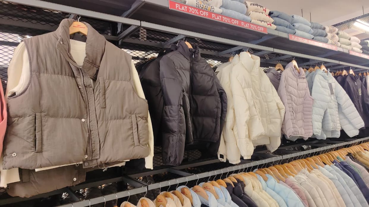 Heavy discounts on woolen clothes, crowd of customers during wedding season
