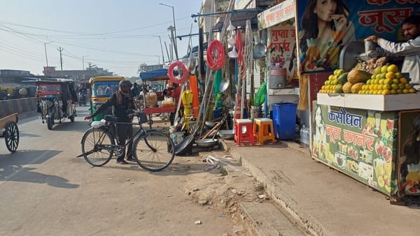Fruit vendors occupy the footpaths, tempo drivers occupy the roads.