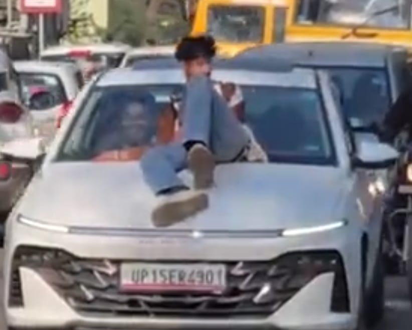 Stunt on the bonnet of a car with UP Government written on it near SSP residence, video goes viral