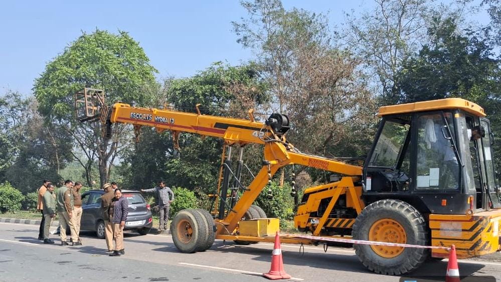 Car hit by truck, two injured