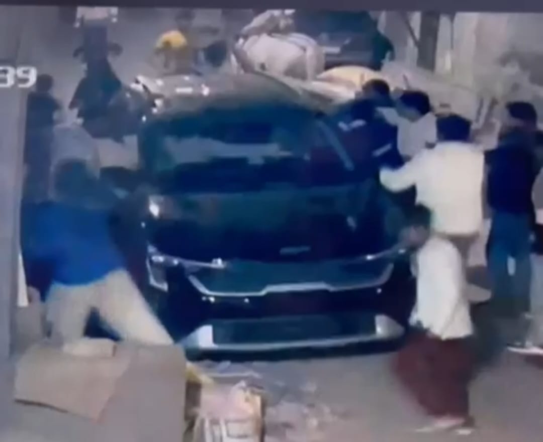 Driver hits youth, 12 youths vandalise car
