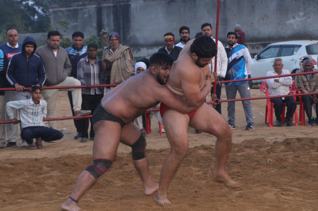 Aman, Deepansh and Chirag won prizes of Rs 31,000 each in the mud wrestling competition.