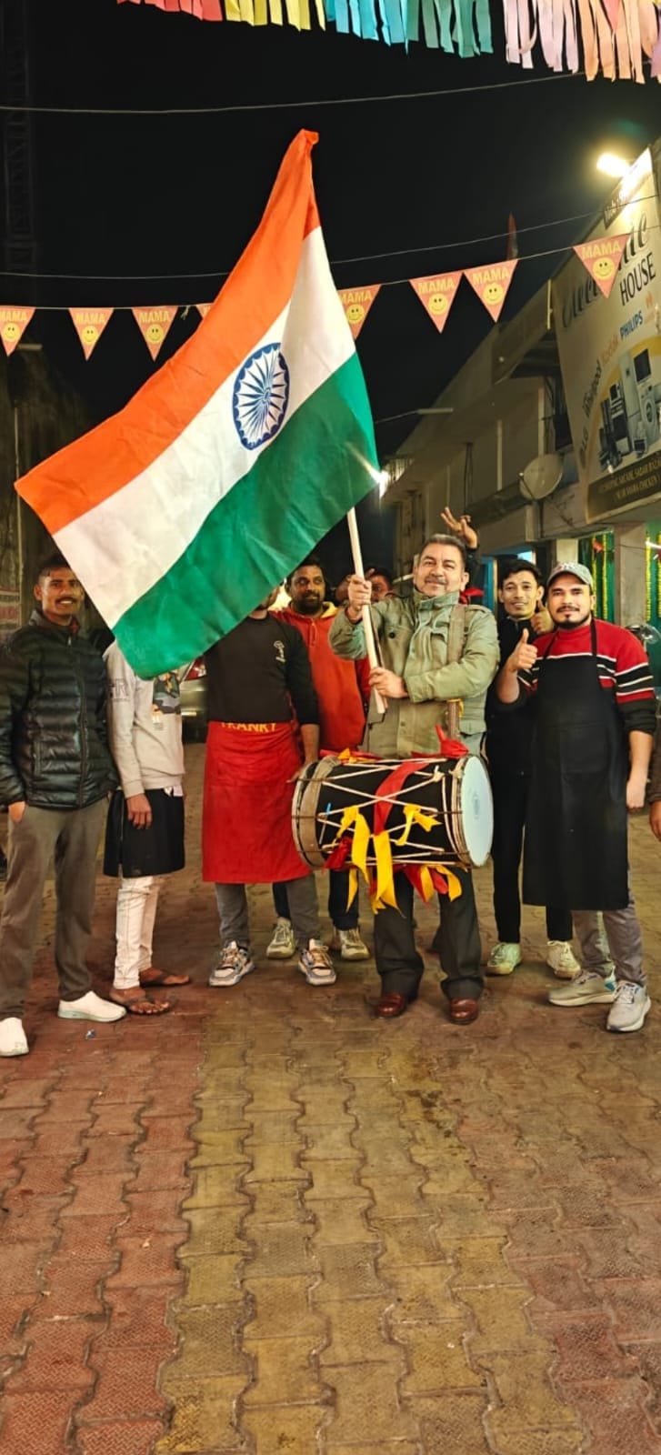 Sports lovers celebrated and waved the tricolor.